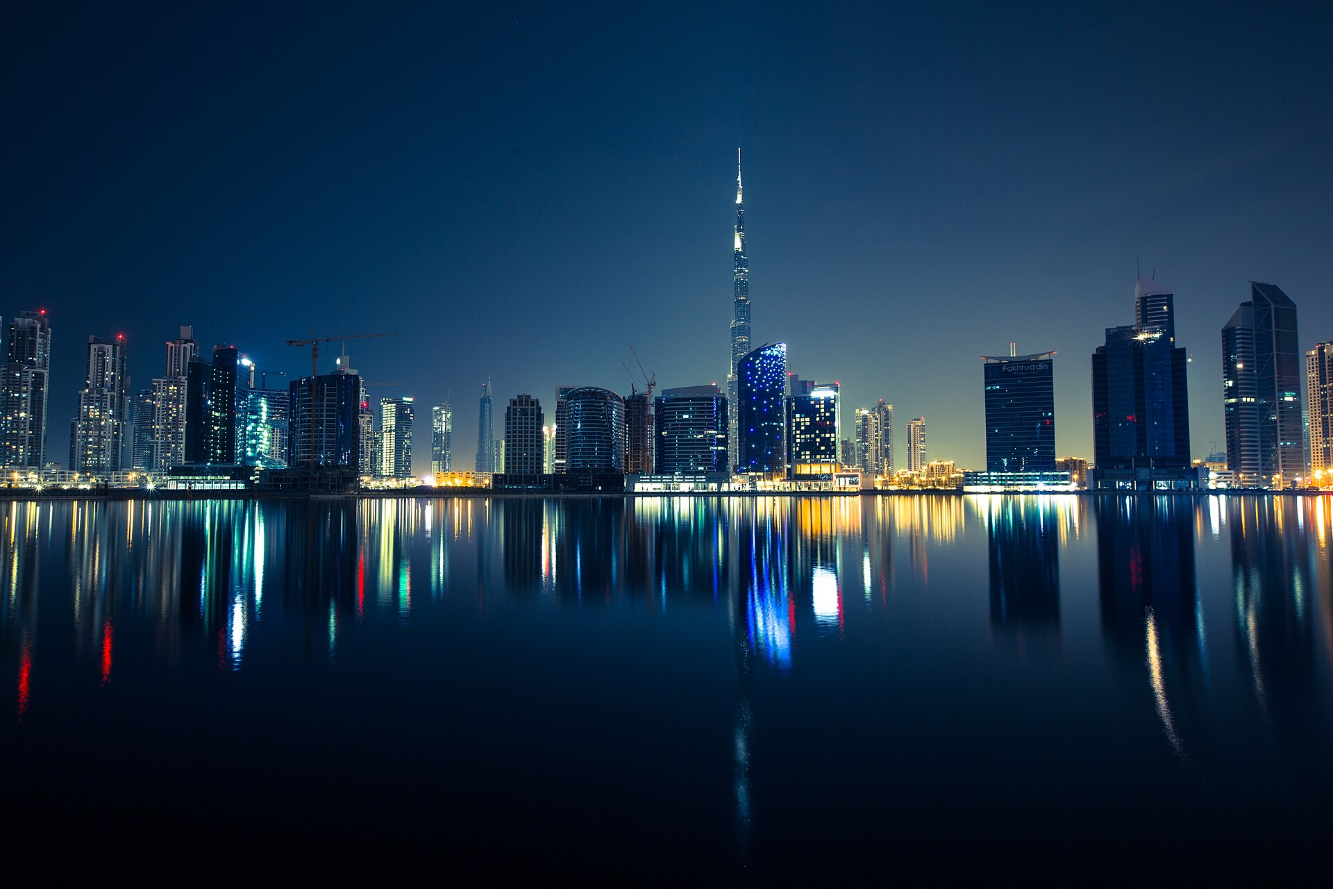 Car rental in Dubai with city roads and skyline